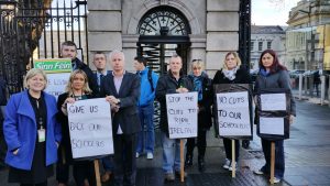 Seán Crowe TD with families at a school transport protest 